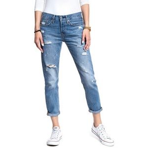 Levi’s 501 high-waisted medium-wash distressed jeans. 💙